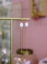 Boucles d'oreilles longues et élégantes doré et cristal de roche