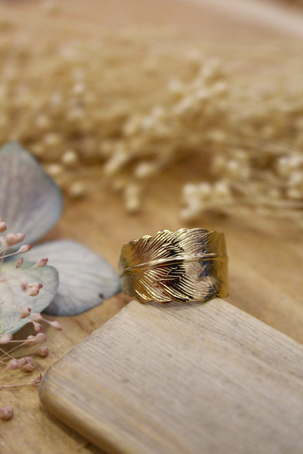 bague auteur, en forme de plume, réglable et ajustable