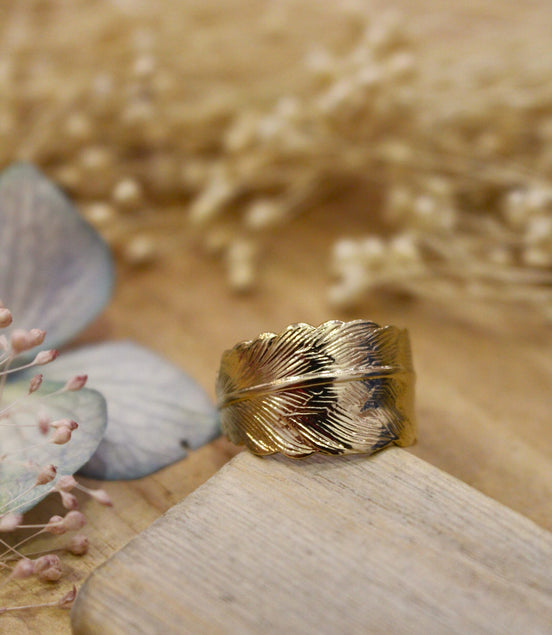 bague auteur, en forme de plume, réglable et ajustable