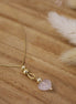 collier de créateurs doré et quartz rose en forme de coeur