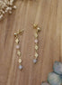 boucles d'oreilles en beryl et fleurs dorées