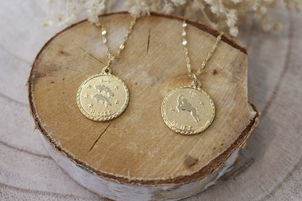 colliers signes astrologique poisson et bélier en laiton doré