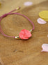 bracelet fleur rose corail cordon ajustable bijou artisanal