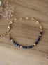 bracelet doré et saphirs
