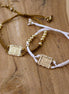 bracelet tissé doré talisman