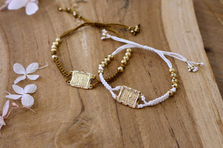 bracelet tissé doré talisman