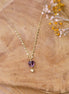 collier doré et coeur améthyste