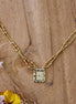 collier doré talisman