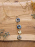 collier long doré céramique bleu