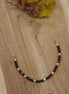 collier ras du cou grenat